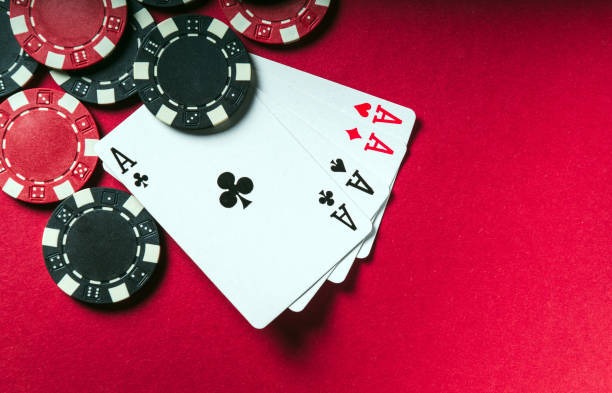Live dealer in broadcast studio rolling dice for Sic Bo